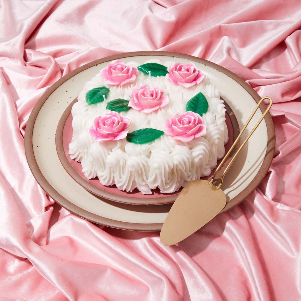 Candles that are not baked goods but have been designed to resemble them in color, size, shape and texture