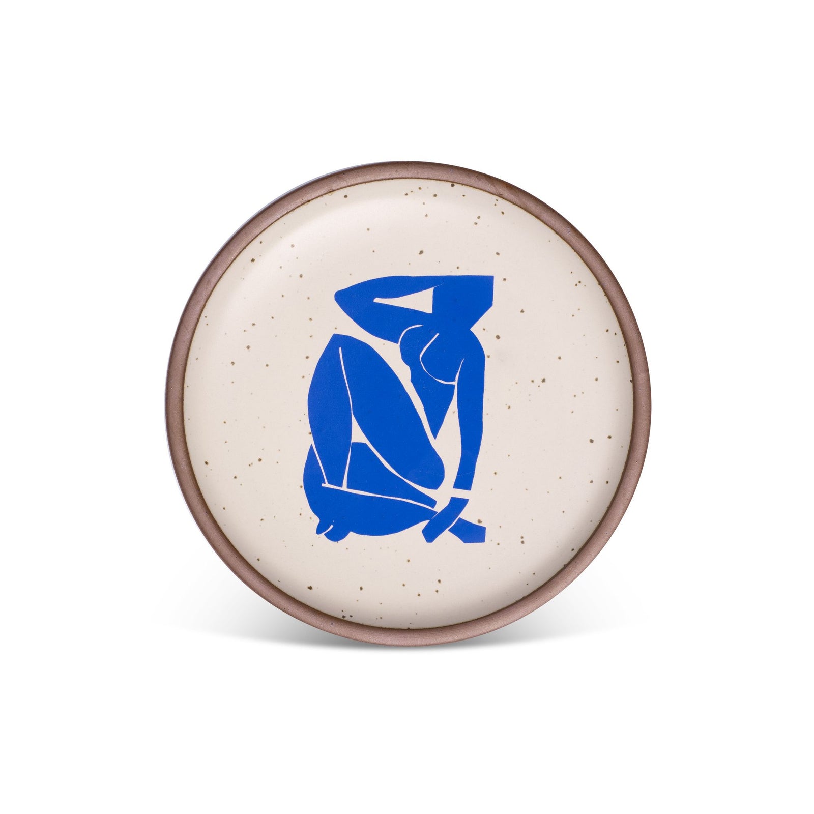 Round ceramic plate with a speckled cream glaze featuring a bold blue abstract figure in the center.