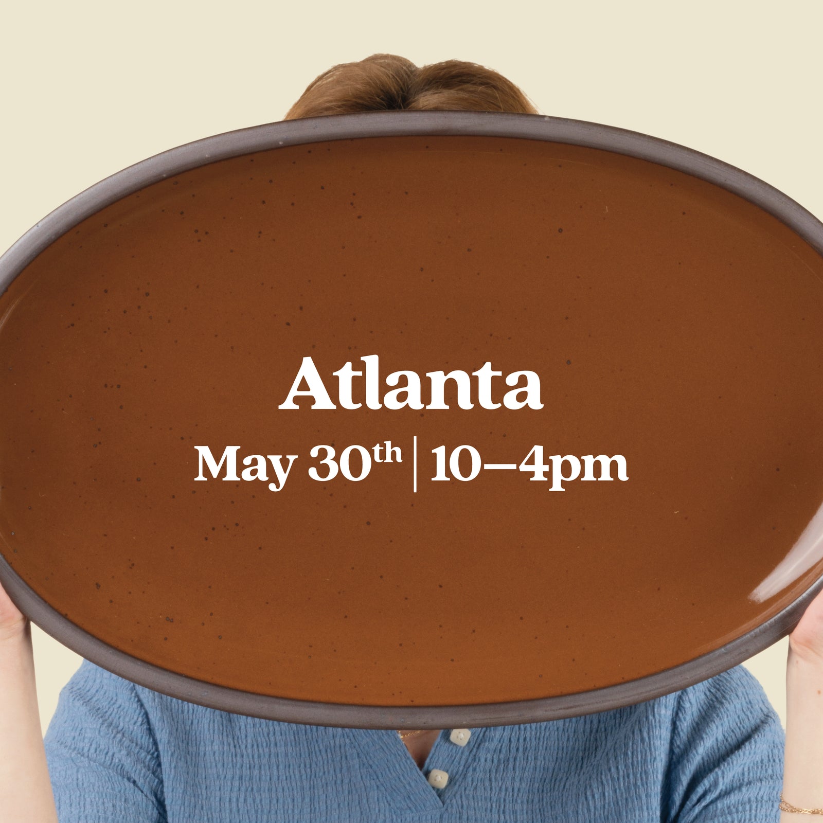 Person holds up an oval platter with text overlay that reads "Atlanta, May 30th 10-4pm"