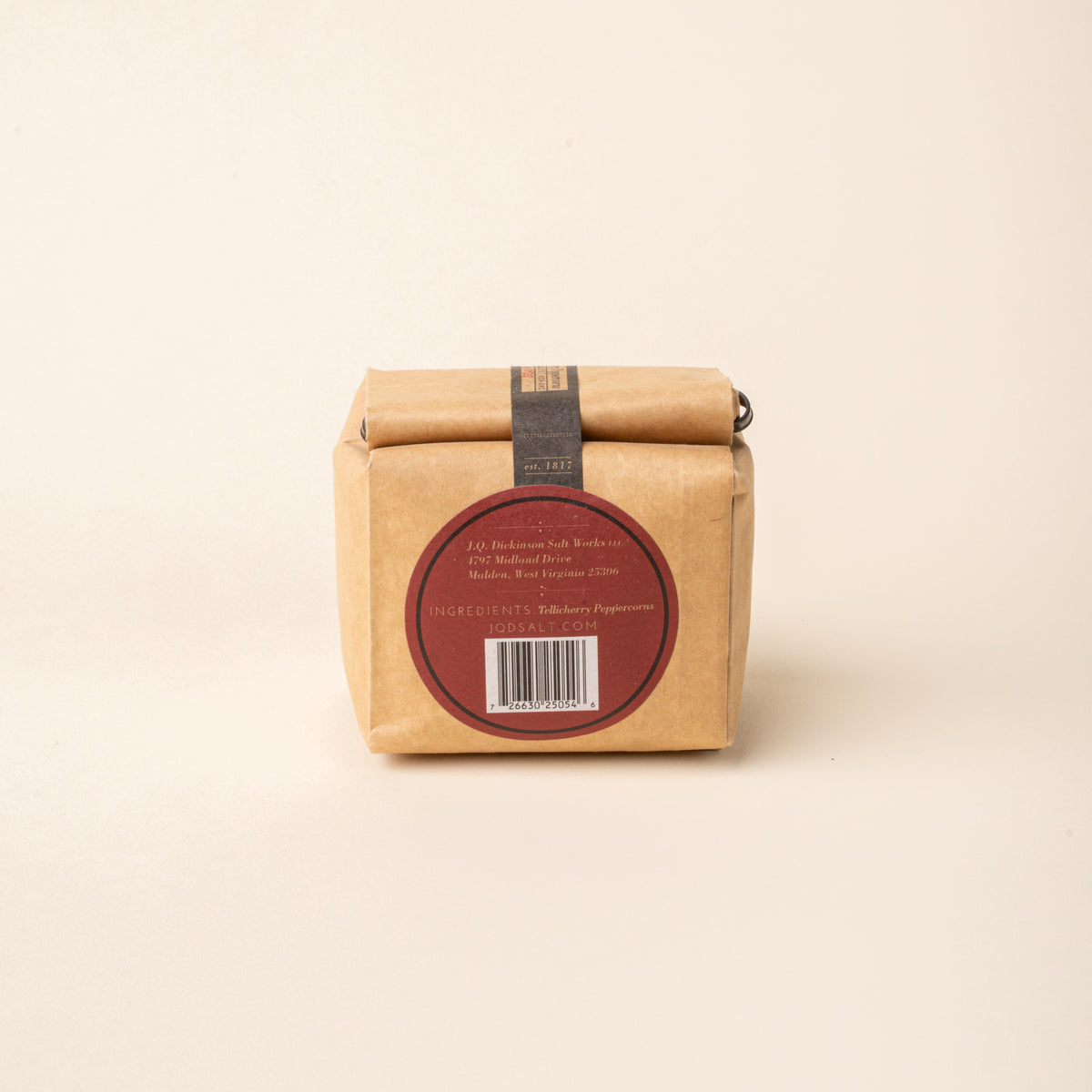Back of Bag of J.Q. Dickinson Tellicherry Peppercorns on a plain white background.
