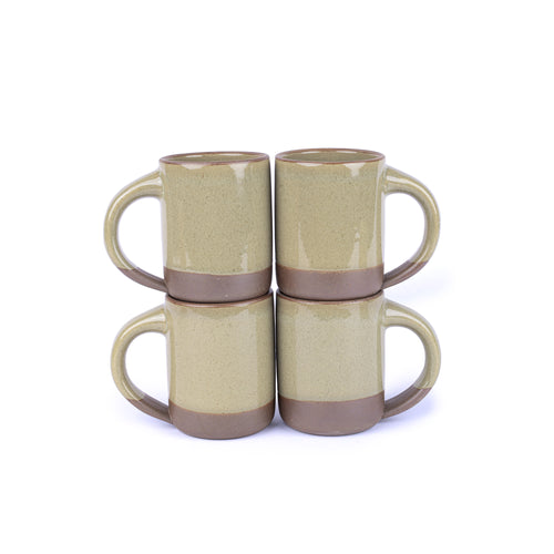 A stack of 4 medium sized ceramic mugs with handle in a dappled, reflective grey-green color featuring an unglazed rim and bottom base.