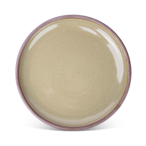 A large ceramic platter in a reflective dappled grey-green color with an unglazed rim
