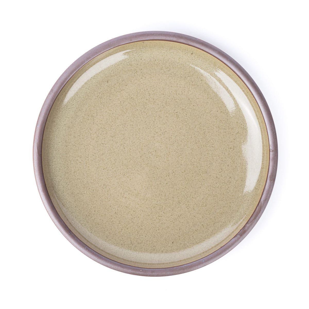 A large ceramic platter in a reflective dappled grey-green color featuring iron speckles and an unglazed rim.