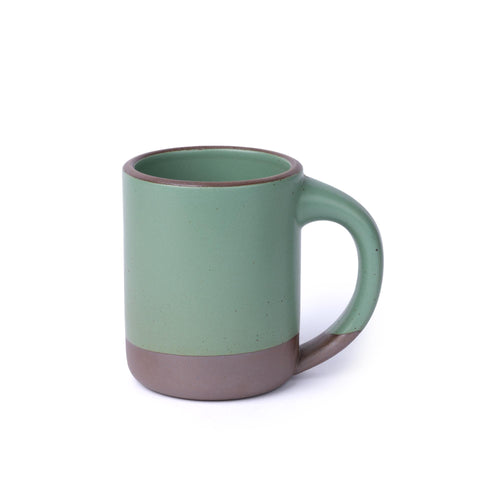 A large ceramic mug with straight walls and sturdy handle in a viridian green glaze with a matte finish.