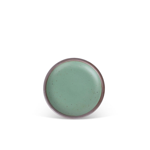 A small ceramic plates with flat surfaces and raised edges in a viridian green glaze with a matte finish.