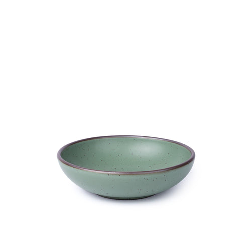A shallow ceramic bowl for daily meals in a viridian green glaze with a matte finish.