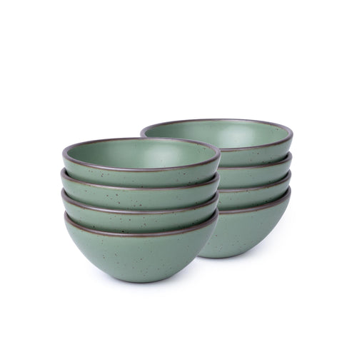 Eight ceramic bowls with higher sides for soups or stews in a viridian green glaze with a matte finish.