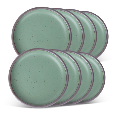 Eight ceramic plates fit for lunch of small meals in a viridian green glaze with a matte finish.