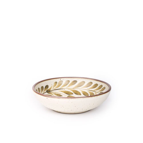Medium ceramic shallow bowl with a hand-painted olive green leaf border on a cream interior and exterior with an exposed clay rim.