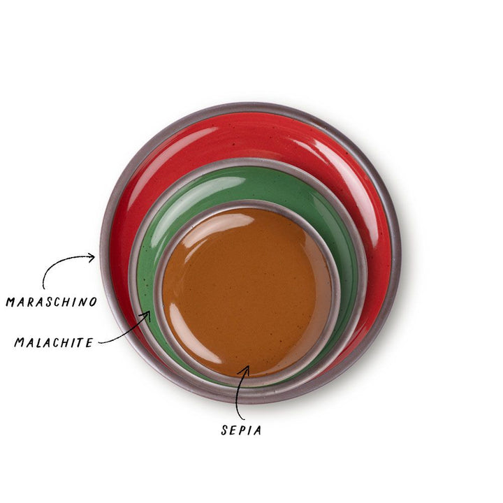 A stack of 3 plates in Dinner, Side, and Cake sizes in a glossy red, green, and brown colors.