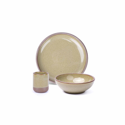 A small tiny cup, a medium sized plate, and a small breakfast bowl paired together in a reflective dappled grey-green color featuring unglazed rims