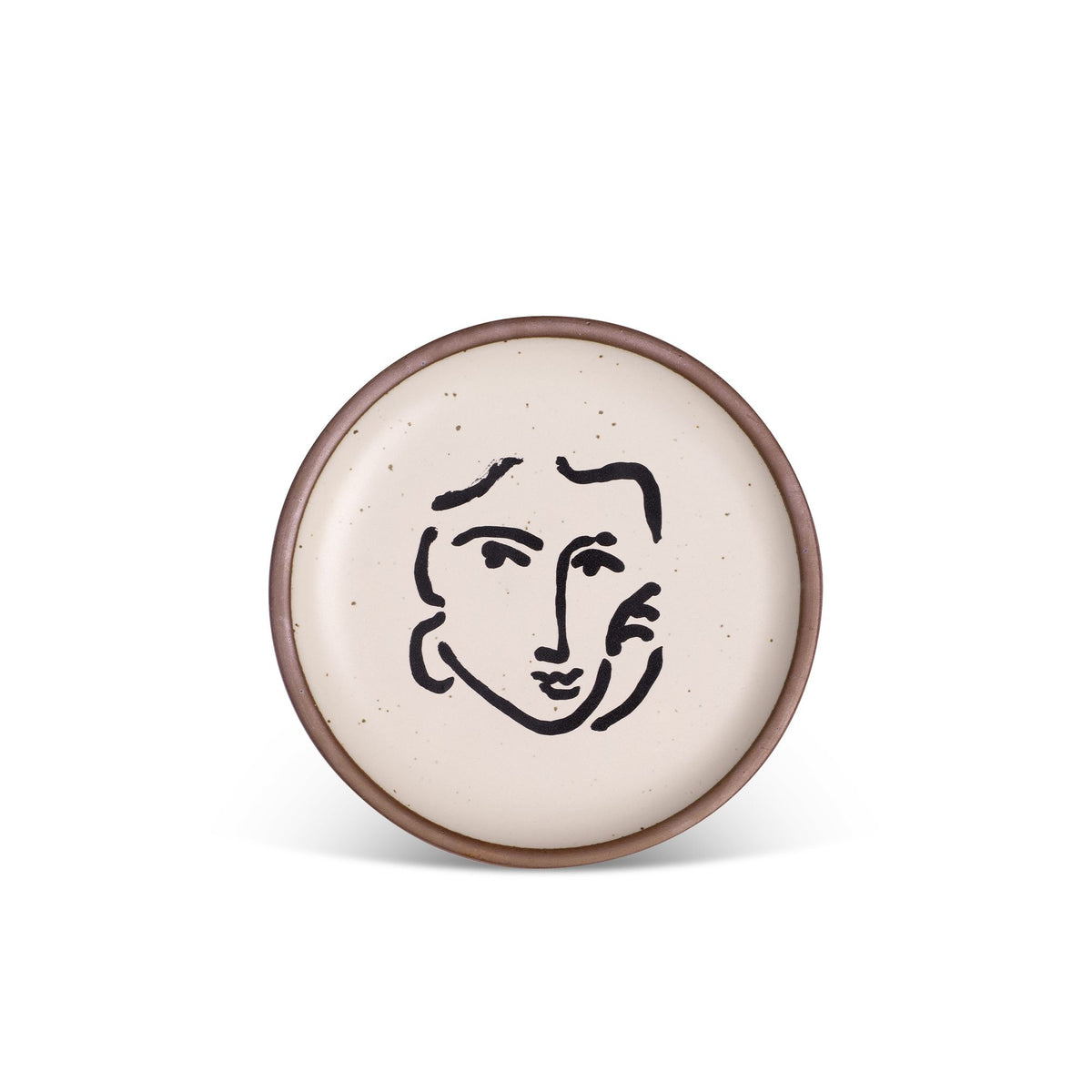 A ceramic plate featuring a decal of the artwork, Nadia au regard sérieux, by Henri Matisse. A minimalist black ink decal of a woman's face and hand resting on one cheek, in an abstract, expressive style centered on an off-white ceramic plate with an unglazed rim.