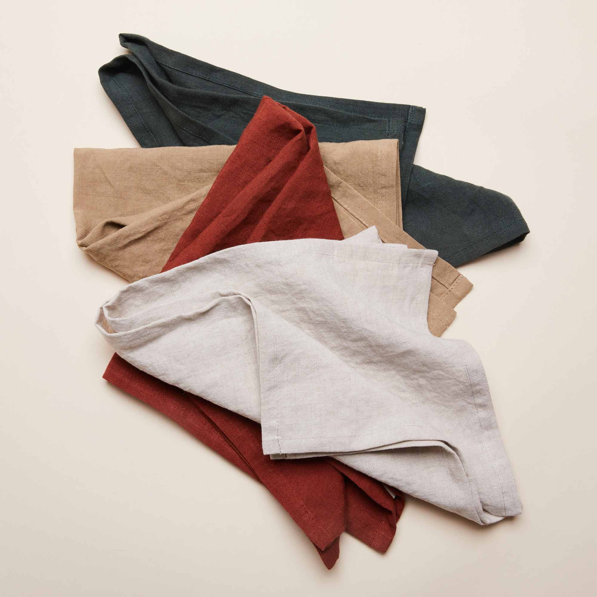 Four folded East Fork napkins